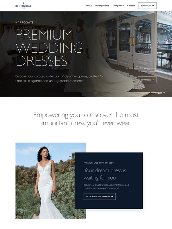 Laptop on desk showing a website layout